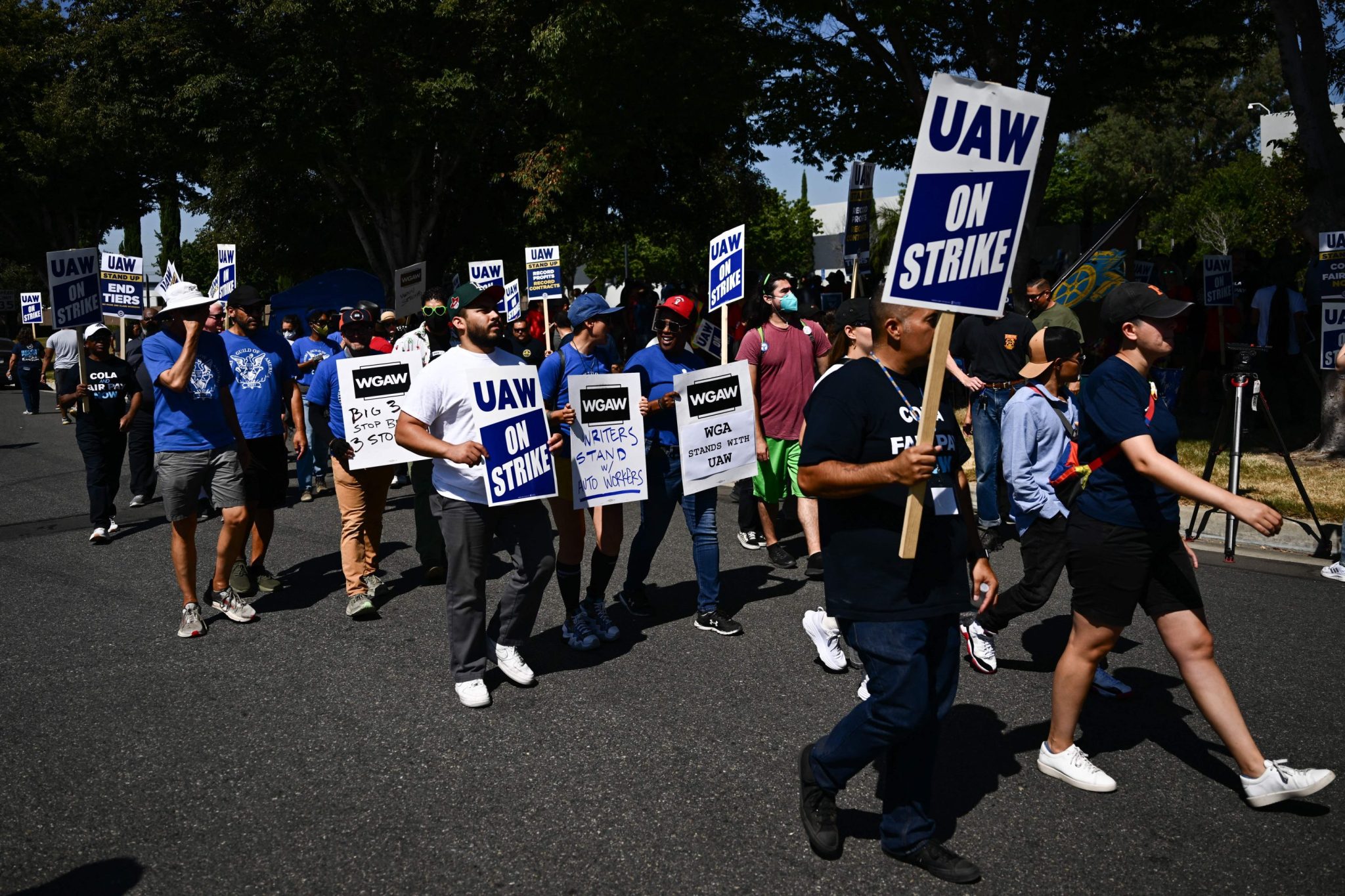 GM and Stellantis are nearing a tentative contract with autoworkers and ending a costly six-week strike after agreeing to a 25% pay hike