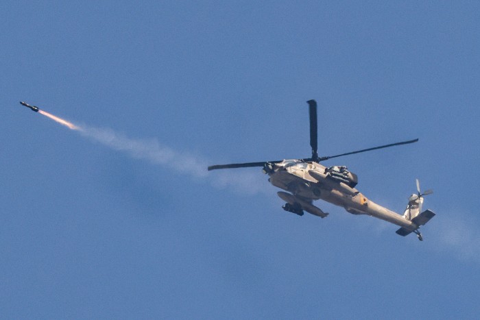 Israeli attack helicopter fires a missile near the Gaza border