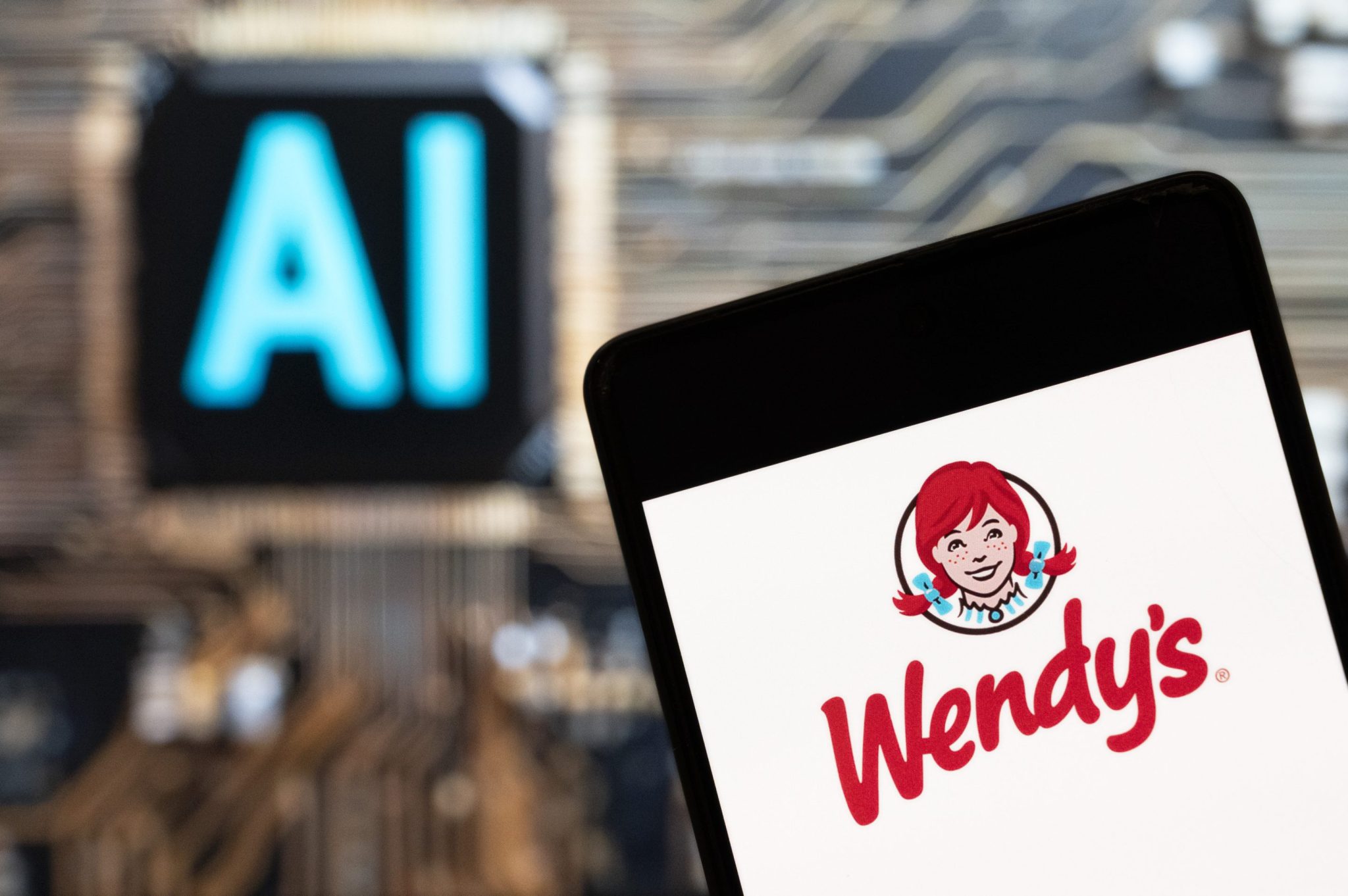 Rideshares, plane tickets, and now spicy chicken sandwiches? Why Wendy’s is bringing AI-powered surge pricing to fast food
