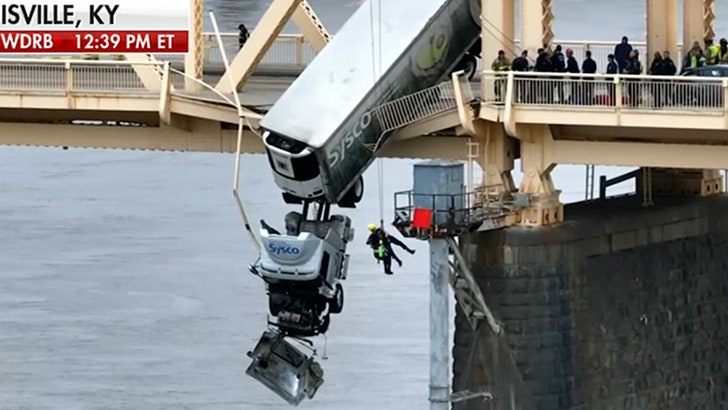Kentucky Truck Driver Dangles Over River From Bridge, Rescue On Camera