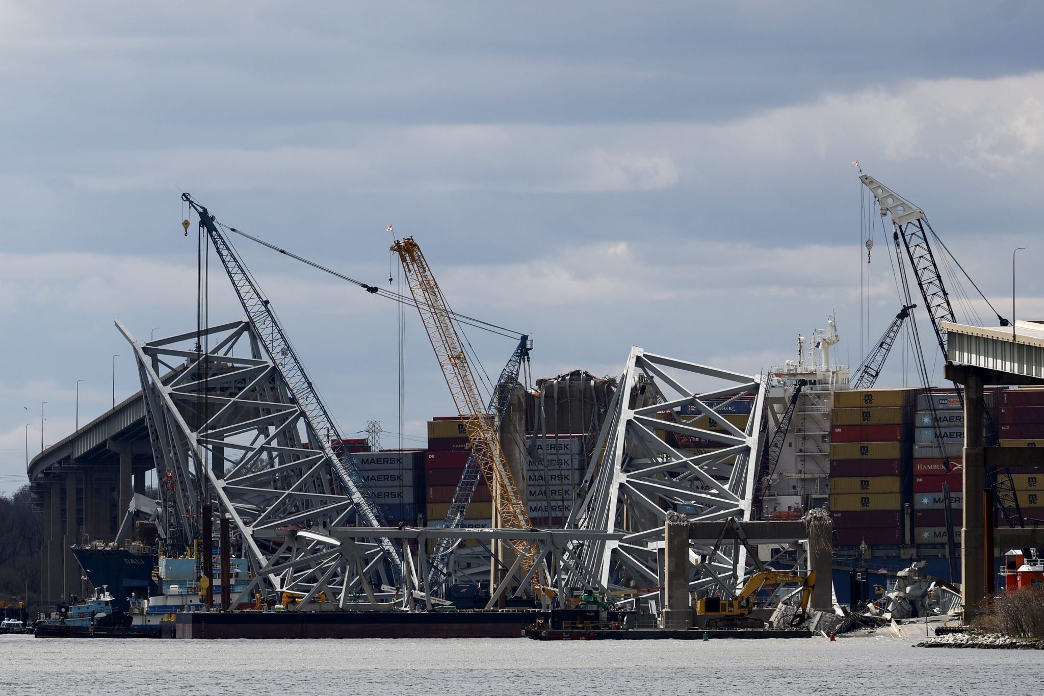 Baltimore salvage crews are removing containers from Dali cargo ship that collapsed the Francis Scott Key Bridge as harbor moves toward reopening