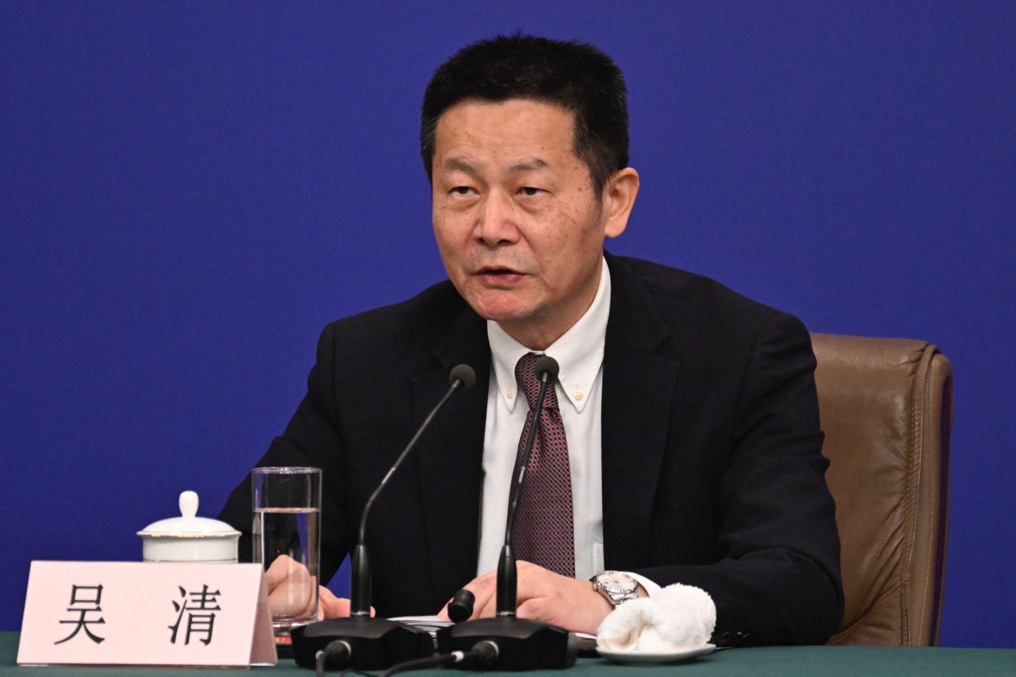 Top Chinese banker steps down after ‘broker butcher’ brother becomes chief market regulator